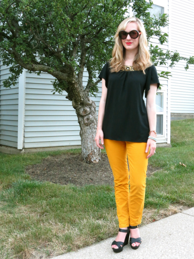 black and yellow, yellow jeans, wedges, wavy hair