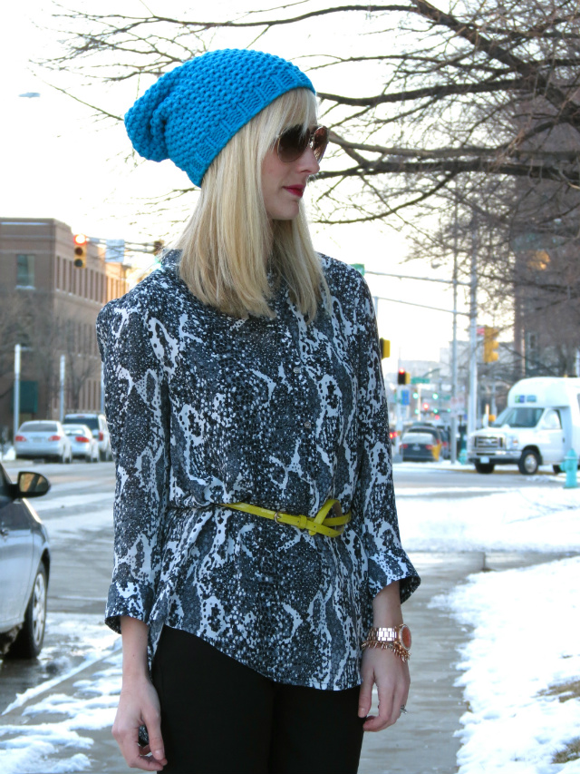 h&m snake print top, belted tunic, ann taylor skinny pants, blue beanie, just cavalli aviators, anne klein studded pumps